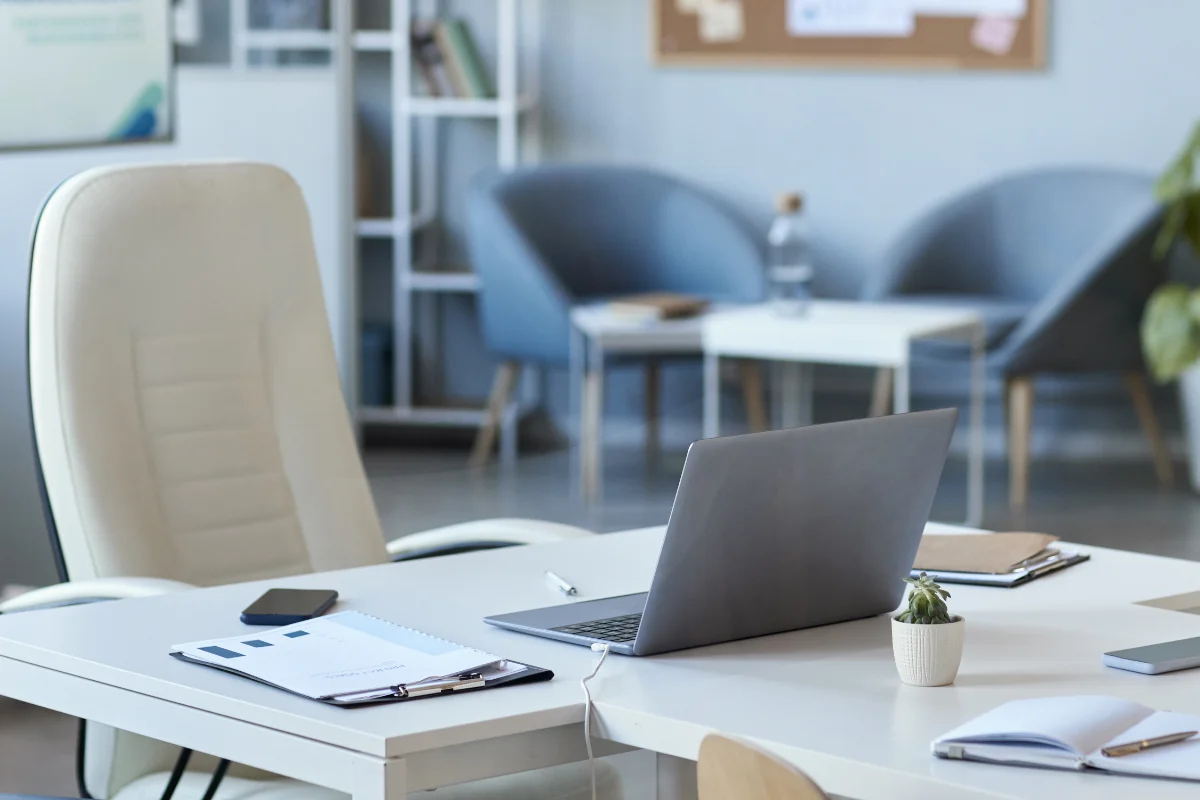 managers-workplace-with-laptop-computer-on-desk