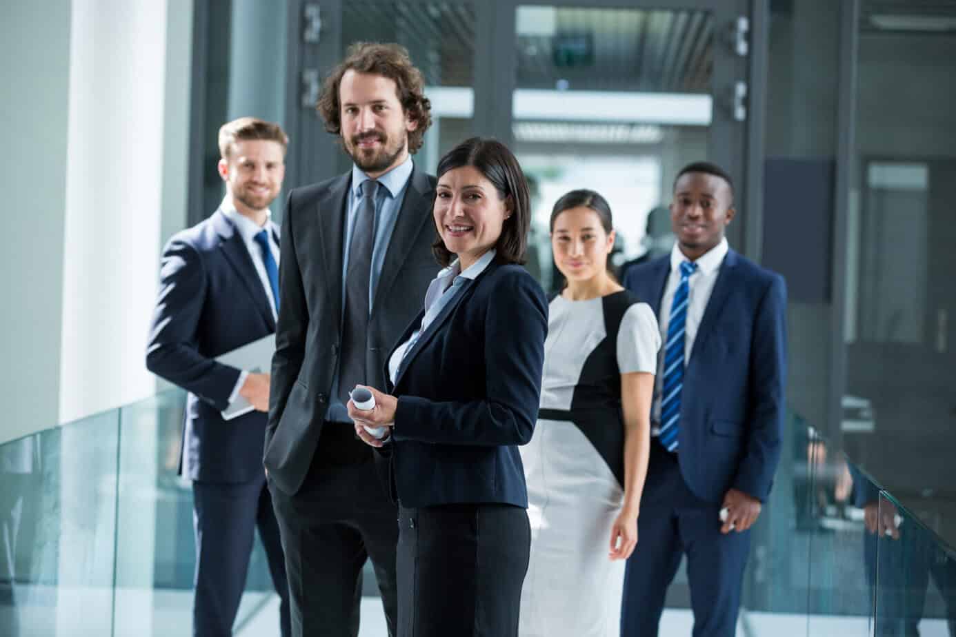 Portrait of confident businesspeople standing in office