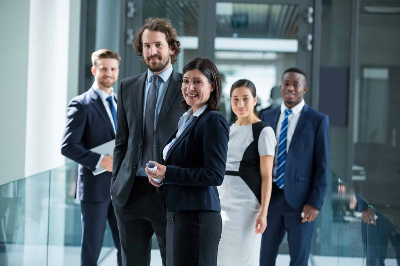 Portrait of confident businesspeople standing in office