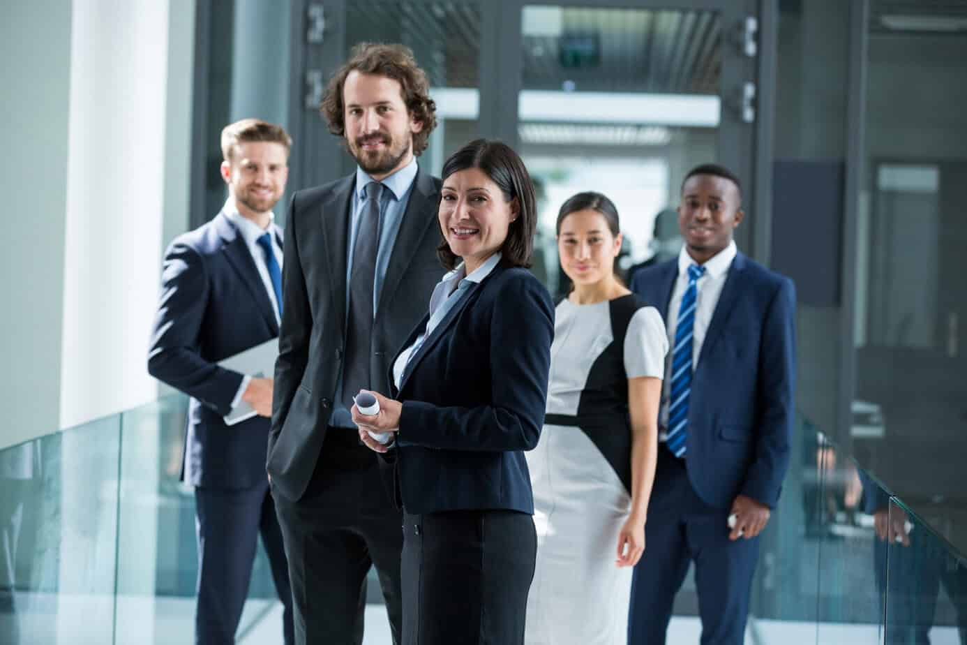 Portrait of confident businesspeople standing in office